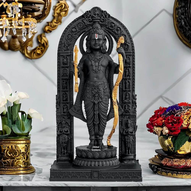 Handcrafted Ram Lalla idol in black stone, adorned with 24K gold details, symbolizing devotion and spiritual beauty.